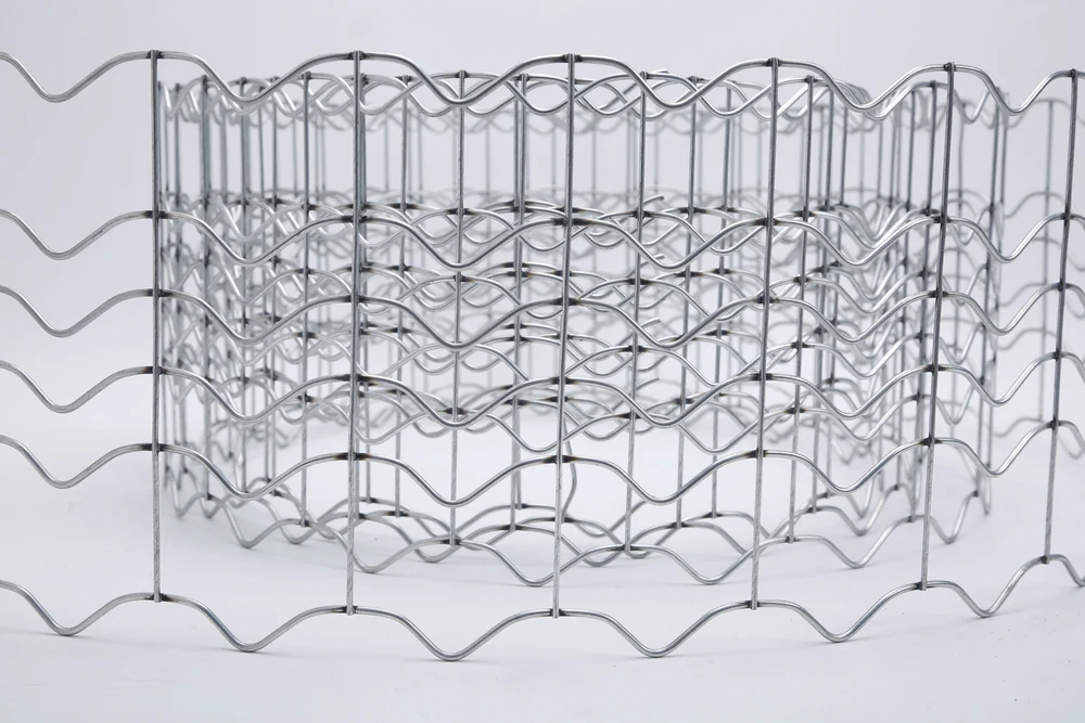 Curved sample of welded pipeline reinforcement mesh